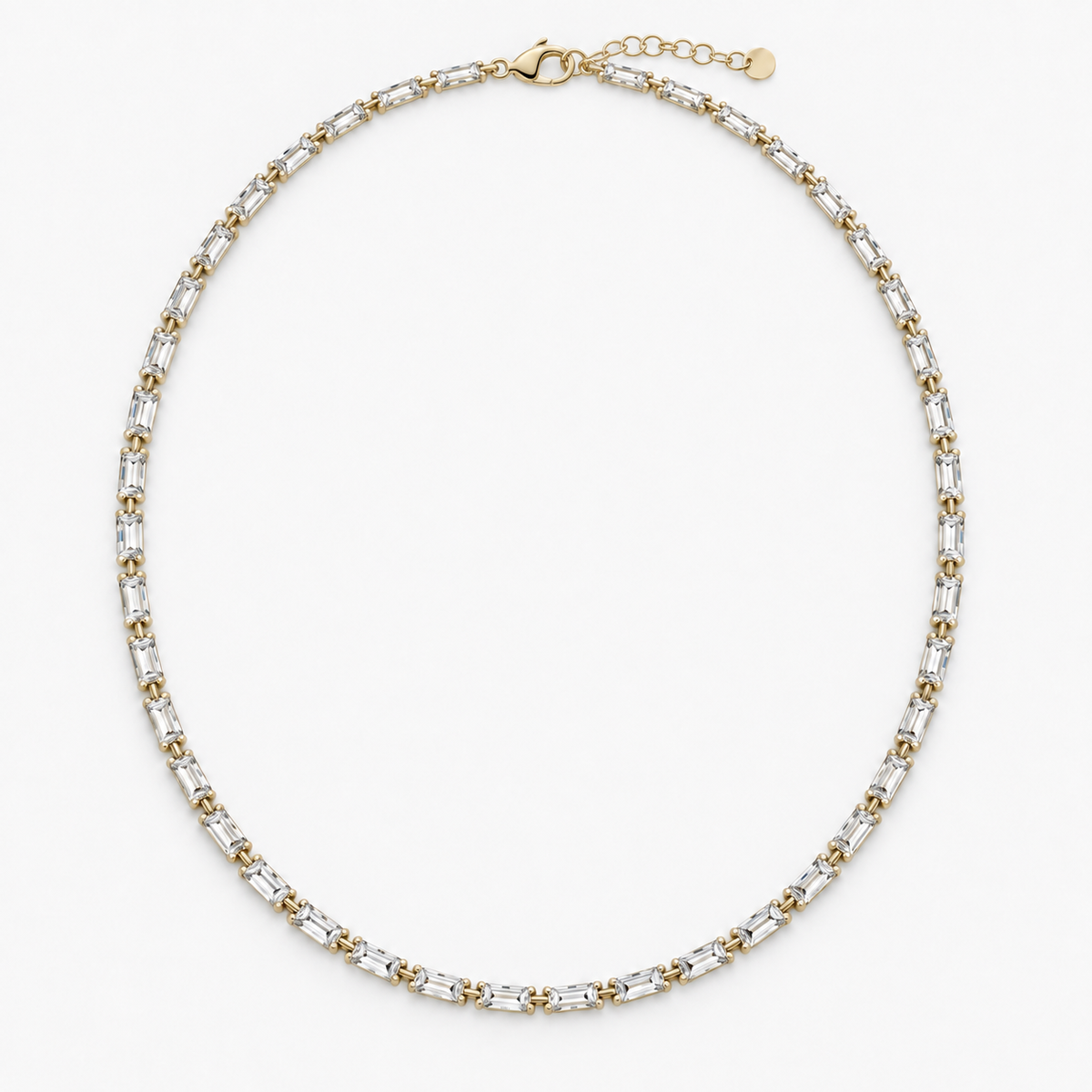 A tennis-style necklace with clear baguette-cut CZ stones and  14k gold-plated links.